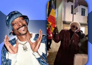 celebrul-artist-snoop-dogg,-filmat-in-timp-de-flutura-un-steag-al-romaniei-la-jocurile-olimpice-de-iarna-de-la-milano-cortina