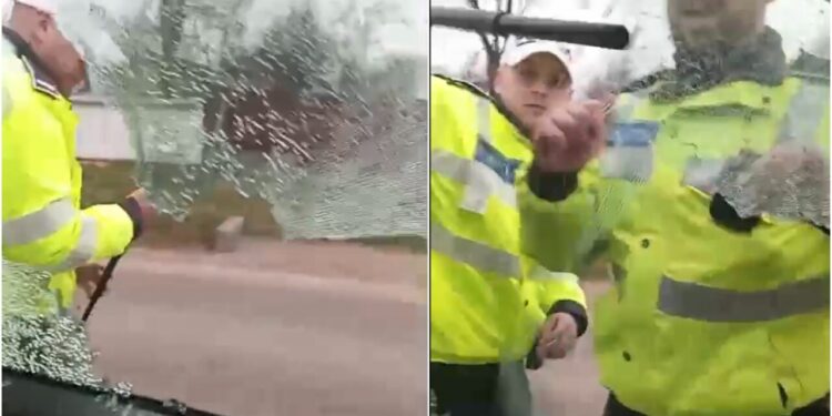 imagini-cu-momentul-in-care-politia-ii-sparge-geamul-masinii-unui-sofer-care-nu-a-vrut-sa-coboare-din-autovehicul